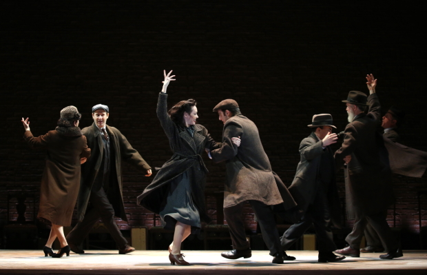 The company of Indecent onstage on Broadway.