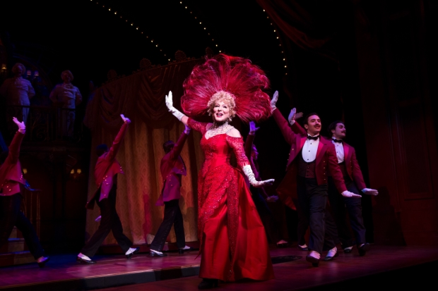 Bette Midler (center) leads the Broadway revival of Hello, Dolly!, directed by Jerry Zaks, at the Shubert Theatre.