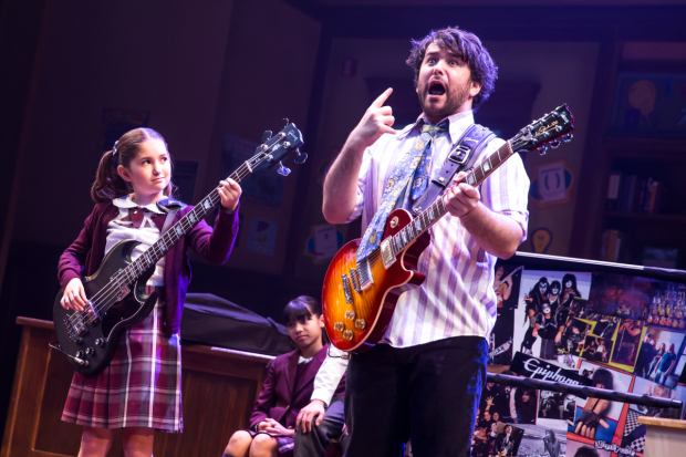 Evie Dolan and Alex Brightman rock out in School of Rock on Broadway.