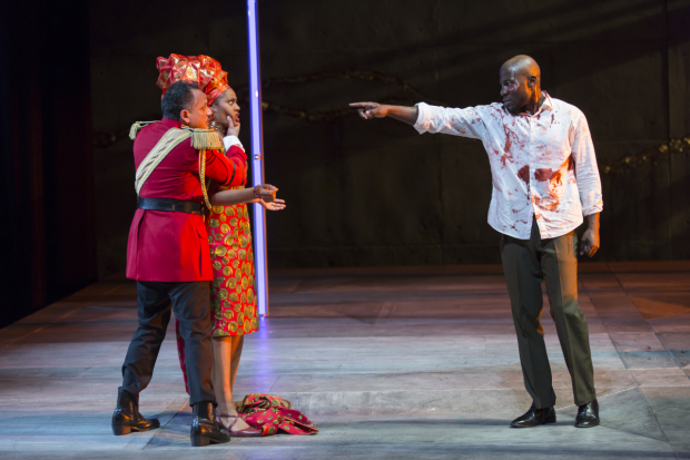Jesse J. Perez as Macbeth, Nikkole Salter as Lady Macbeth, and McKinley Belcher III as Banquo in Macbeth, directed by Liesl Tommy, at Shakespeare Theatre Company. 