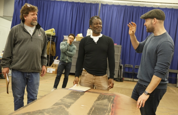 John Douglas Thompson (center) in rehearsal for Julius Caesar with director Oskar Eustis (left) and fellow cast member Corey Stoll (right).