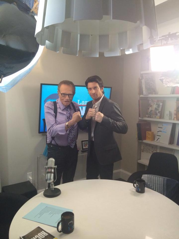 Larry King and Andy Karl give the camera their best Rocky poses.