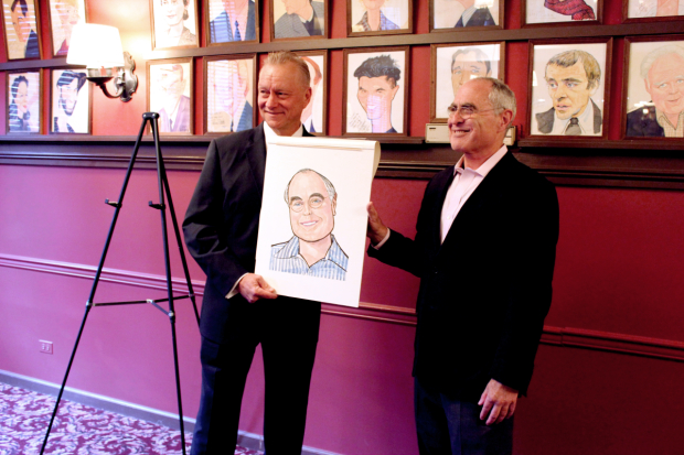 Todd Haimes (right) receives his portrait.