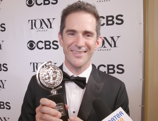 Andy Blankenbuehler shows off his Tony Award.
