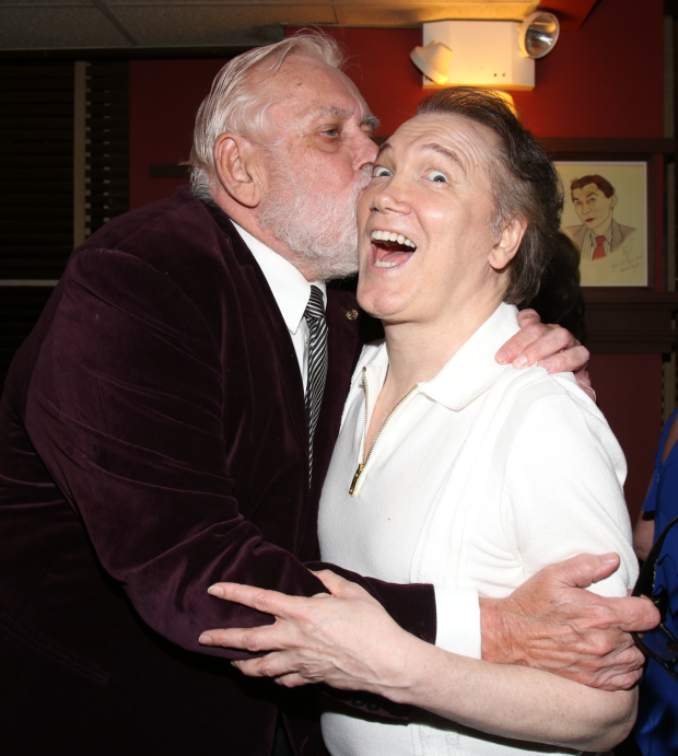 Jim Brochu celebrates opening night of Zero Hour by planting one on Charles Busch&#39;s cheek.