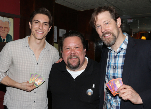 Anastasia stars Derek Klena and John Bolton show off their trading cards with artist Squigs (center).