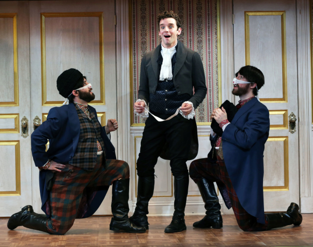 Ryan Garbayo, Michael Urie, and Ben Mehl in a scene from The Government Inspector.