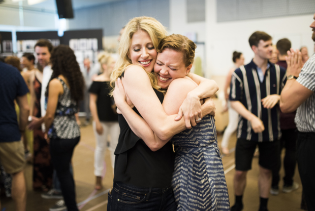 On stage sisters Caissie Levy and Patti Murin embrace on the first day of rehearsals for Frozen, directed by Michael Grandage.