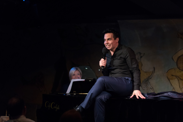 Mary-Mitchell Campbell looks on as Mario Cantone regales the Café Carlyle audience with an outrageous story.