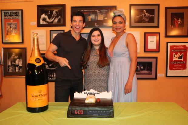 Andy Karl (left) and Barret Doss (right) celebrate 100 performances of Groundhog Day with a unique cake baked by Dina Jawetz.