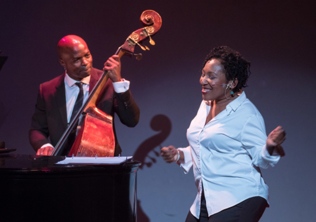 Andrea Frierson (right) shares the stage with Richie Goods (left) on the bass.