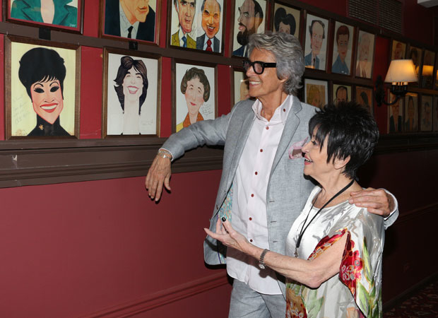 Tommy Tune and Chita Rivera have a laugh at her portrait.