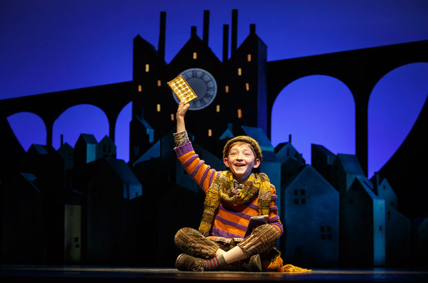 Ryan Foust as Charlie Bucket in Charlie and the Chocolate Factory, which announced a digital lottery for all performances starting today.