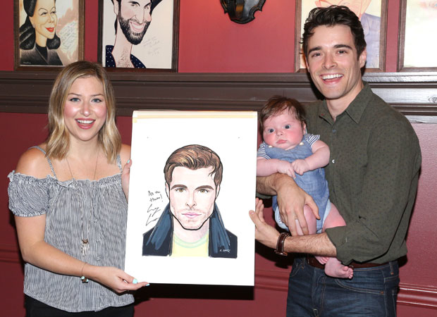 Corey Cott (right) and his family excitedly show off their newest likeness.