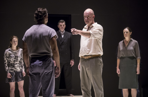 Ian Bedford (Eddie), Catherine Combs (Catherine), Brandon Espinoza (Marco), James D. Farruggio (Officer), and Andrus Nichols (Beatrice) in A View From the Bridge, directed by Ivo van Hove at the Goodman Theatre.