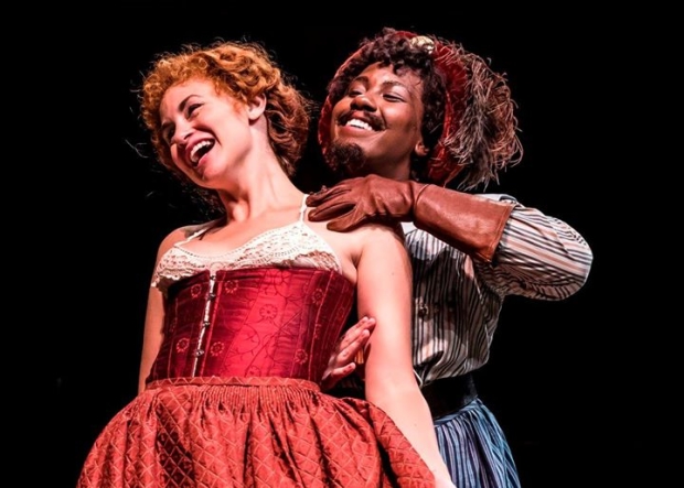 Alexandra Henrikson (Katherine) and Crystal Lucas-Perry (Petruchio) in The Taming of the Shrew, directed by Barbara Gaines, at Chicago Shakespeare Theater. 