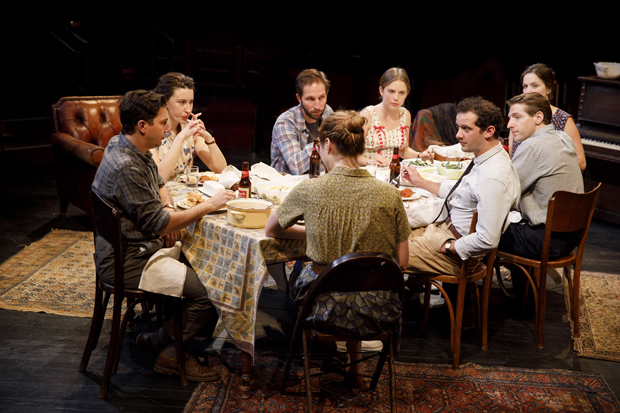 The company of Richard Nelson&#39;s Illyria sits down to eat.