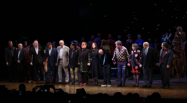 Lebo M (bowing center) takes a curtain call with Elton John, Julie Taymor, and the rest of The Lion King&#39;s original creative team at the show&#39;s 20th anniversary performance on November 5 at the Minskoff Theatre.