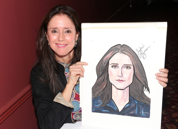Tony winner Julie Taymor poses next to her portrait at Sardi&#39;s.