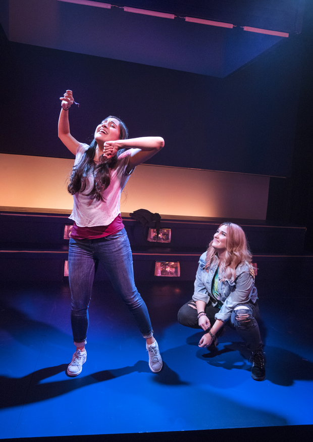 Sam (Krystina Alabado) and Kelly (Emma Hunton) dance in The Mad Ones.