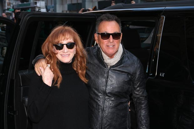 Patti Scialfa and Bruce Springsteen pose outside of the Walter Kerr Theatre.
