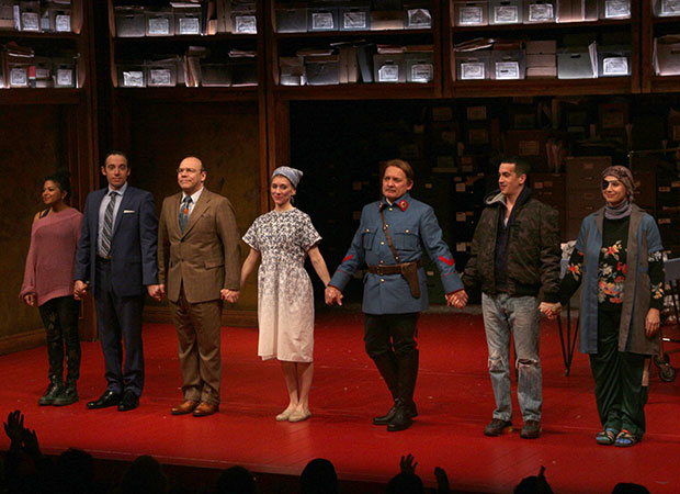 The cast of Describe the Night take a bow at curtain call.