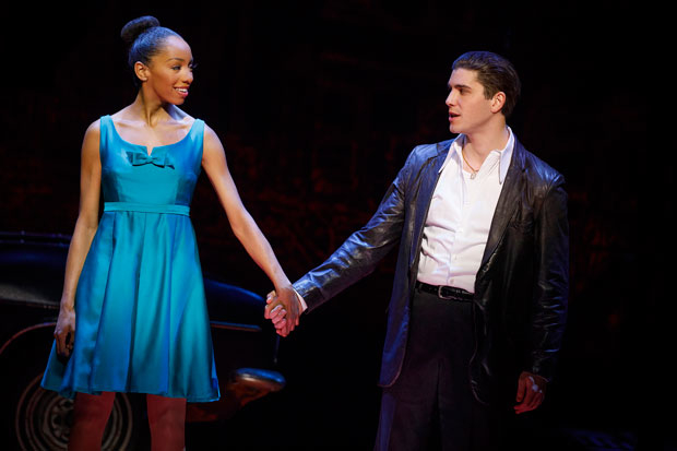 Christiani Pitts and Adam Kaplan take hands in a scene from A Bronx Tale at the Longacre Theatre.