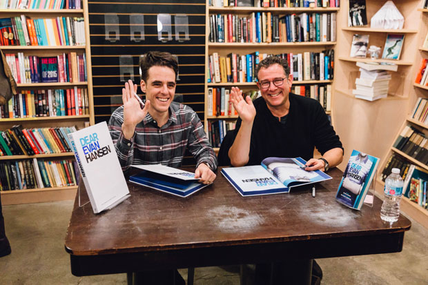Steven Levenson and MIchael Greif sign books for fans at Dear Evan Hansen.