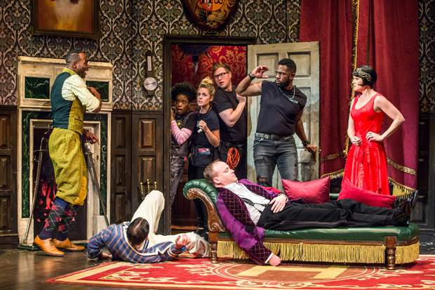 Clifton Duncan, Alex Mandell (on floor), Ashley Bryant, Katie Sexton, Ned Noyes, Jonathan Fielding, Akron Watson, and Amelia McClain star in &#39;&#39;The Play That Goes Wrong, directed by Mark Bell for Mischief Theatre at Broadway&#39;s Lyceum Theatre.