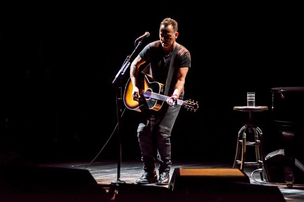 Bruce Springsteen stars in Springsteen on Broadway at the Walter Kerr Theatre.