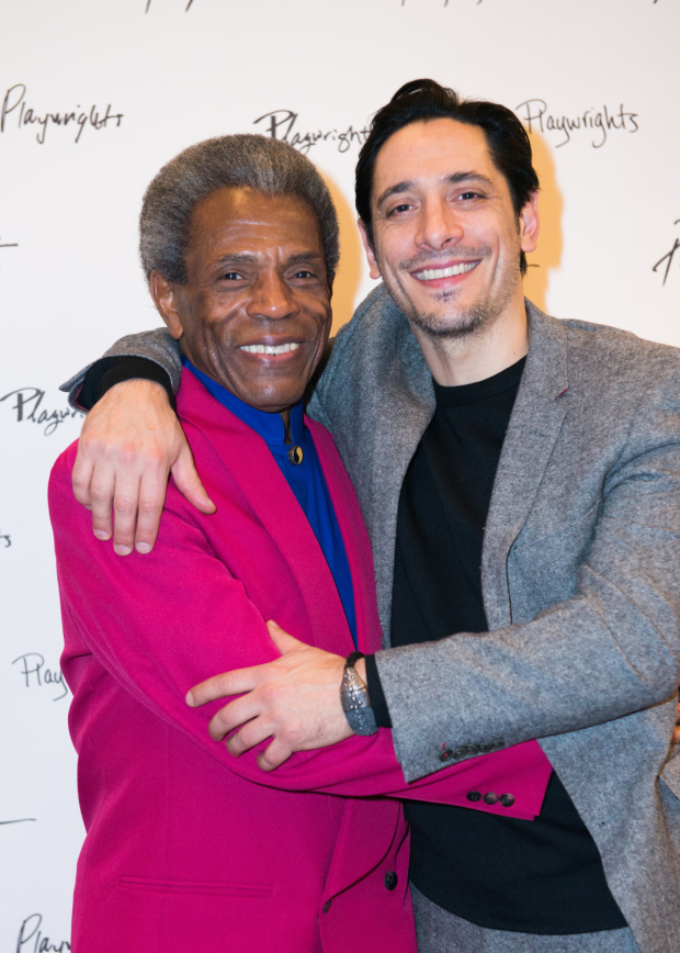 Cast members André De Shields and Ariel Shafir share an embrace.