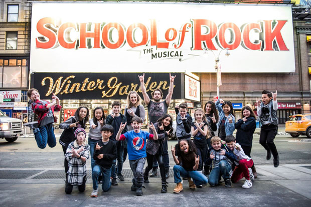 Justin Collette, Analisa Leaming, and the kids of School of Rock.