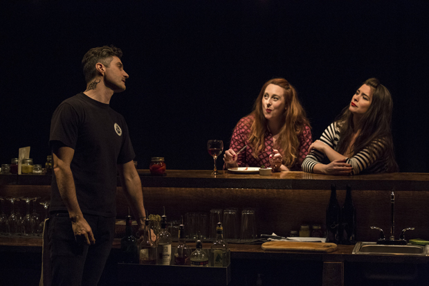 Doug the Bartender (Noel Joseph Allain) speaks with Porto (Julia Sirna-Frest) and Dry Sac (Leah Karpel) in [PORTO].
