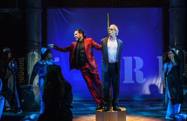 Will Swenson plays Satan, and Terrence Mann plays Jerry Springer in Jerry Springer — The Opera.