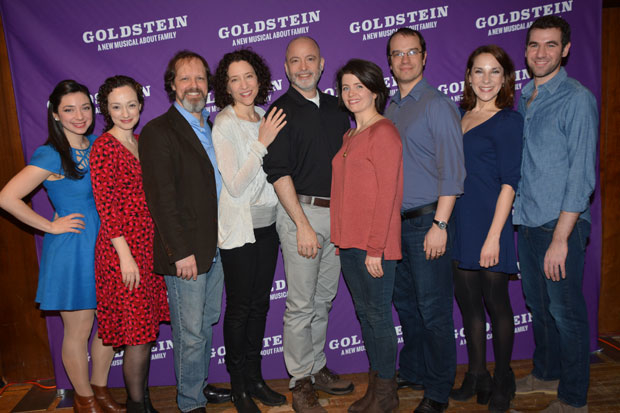 The company of Goldstein meet the press.