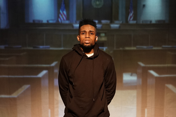 Brad Peterson and Howard Olah-Reiken&#39;s projections depict a courtroom in Steven Prescod&#39;s A Brooklyn Boy.