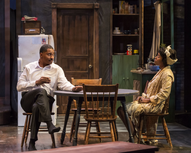 Ben Cain (Walter Lee) and Toya Turner (Ruth Younger) in a scene from A Raisin in the Sun, directed by Gregg T. Daniel, at A Noise Within.