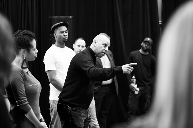 Director Ruben Santiago-Hudson addresses the cast during rehearsal.