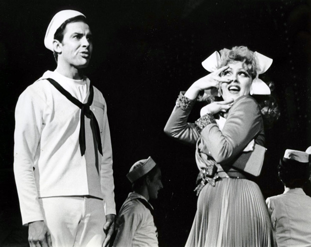 A sailor on shore leave (Ron Husmann, left) looks past the charms a female cabbie (Bernadette Peters) in the 1971 Broadway revival of On the Town. 