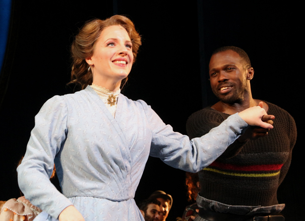 Jessie Mueller takes a bow as Joshua Henry looks on.