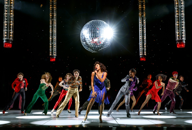 Ariana DeBose as Disco Donna and the ensemble of Summer: The Donna Summer Musical, directed by Des McAnuff, at the Lunt-Fontanne Theatre.