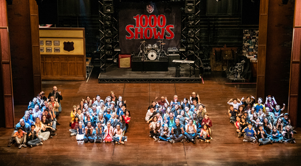 Past and present School of Rock cast members form the number &quot;1,000&quot; at the Winter Garden Theatre to mark its upcoming 1,000th performance on Broadway.