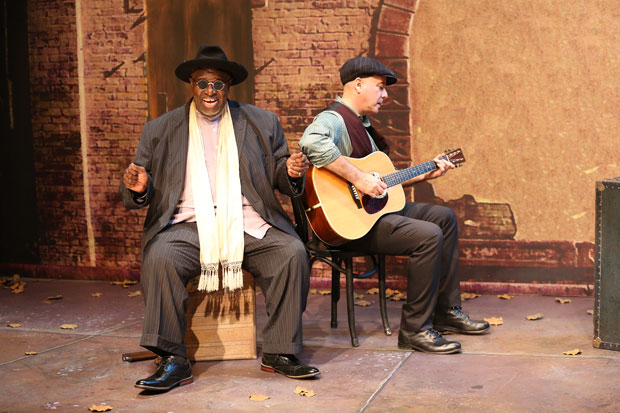Actor Akiń Babatundé and guitarist David Weiss perform Lonesome Blues under the direction of Katherine Owens.