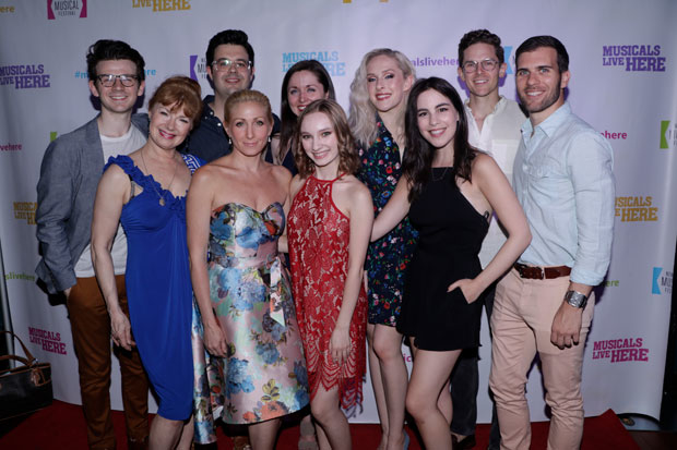 The company of Between the Sea and Sky walks the red carpet at the New York Musical Festival opening night party.