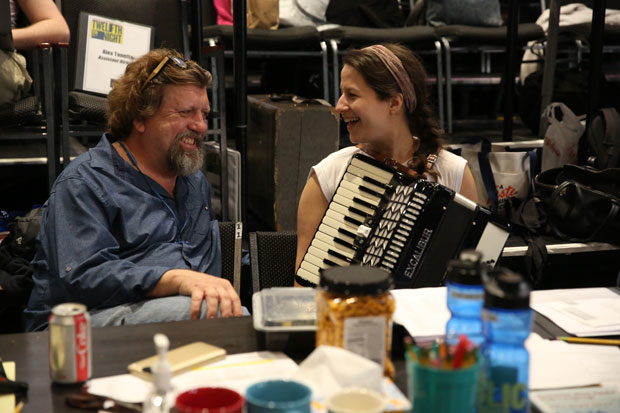 Director Oskar Eustis and songwriter Shaina Taub enjoy a laugh during rehearsal.