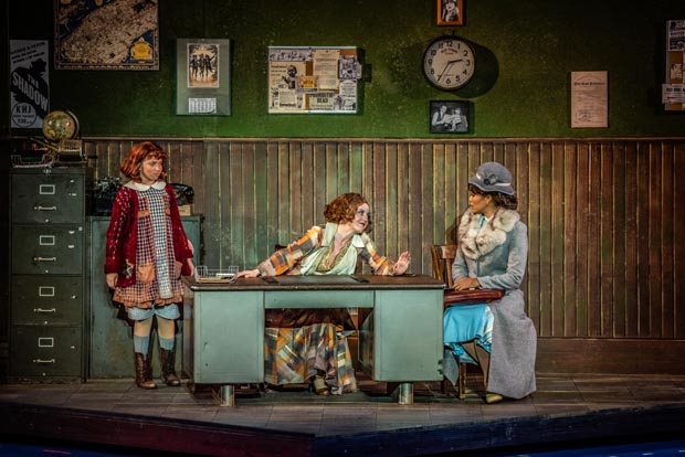 Peyton Ella, Jennifer Simard, and Britney Coleman share a scene in Annie, playing through July 25.