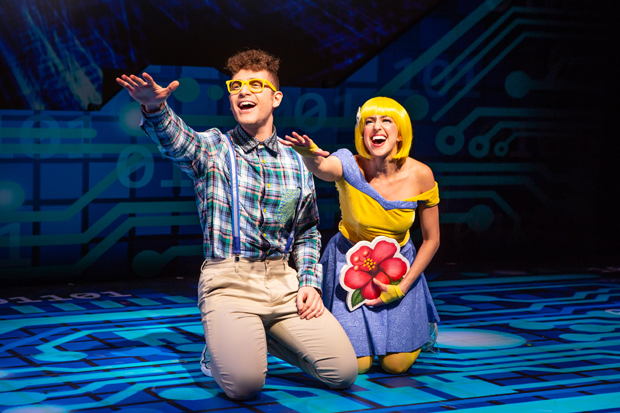 Keith Harrison plays Nerd Face and Laura Nicole Harrison plays Smiling Face with Smiling Eyes in Emojiland, directed by Thomas Caruso, for NYMF at the Acorn Theatre.