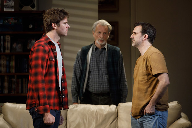 Drew (Armie Hammer) confronts Matt (Paul Schneider) as Ed (Stephen Payne, center) looks on in Straight White Men.
