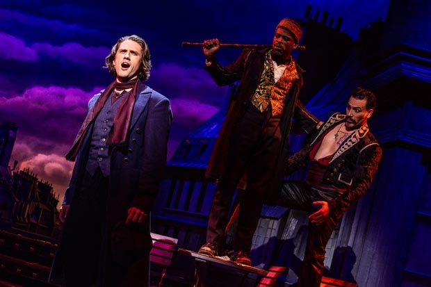 Aaron Tveit stars as Christian, seen here with Sahr Ngaujah as Toulouse-Lautrec and Ricky Rojas as Santiago.
