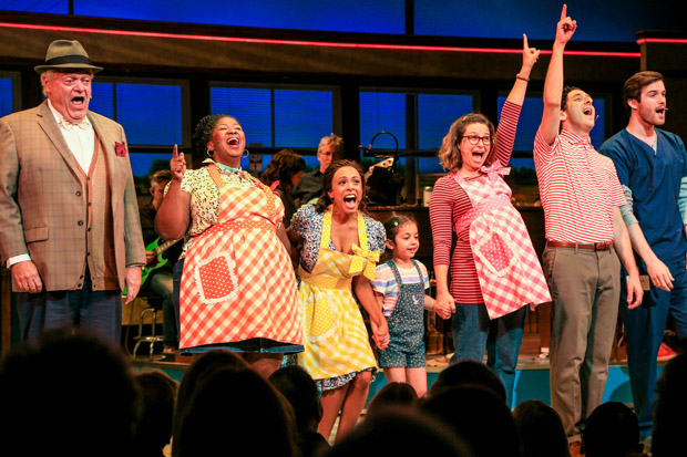 Nicolette Robinson (center) takes her first bow as Jenna in Waitress.